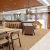 SpringHill Suites by Marriott Beaufort lobby lounge with tables, bar seating, and a modern reception area