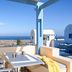 Maria's Place - Adults Only in Oia, terrace dining with sea view and white-blue Cycladic architecture