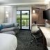 Courtyard by Marriott Fort Worth at Alliance Town Center room with balcony view, sofa, desk and TV