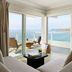 Pacific Edge Hotel in Laguna Beach suite with ocean-view balcony and seating area