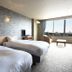 Taoya Shirahama Senjyo guest room with twin beds and balcony window view in Shirahama
