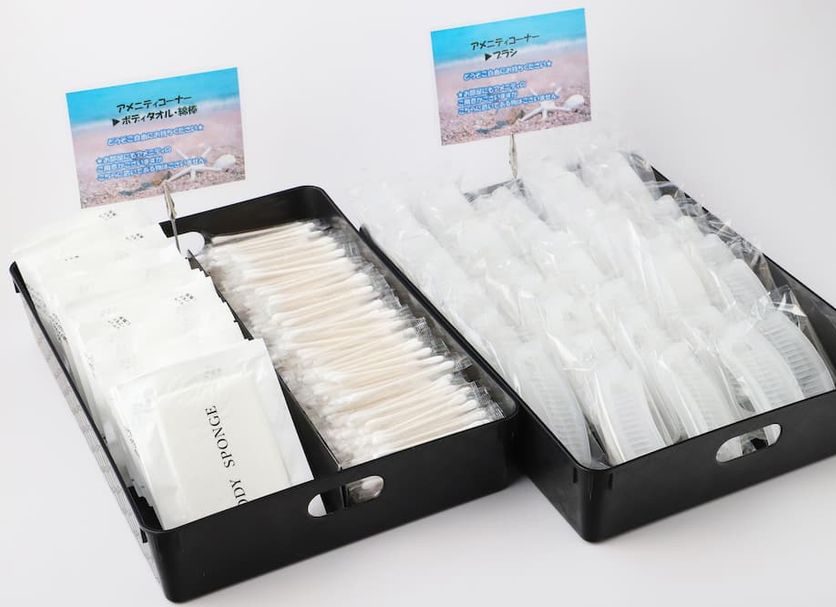 Smile Hotel Aomori breakfast trays with packed utensils and condiments on a white surface