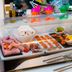 Sozo Hotel Nantes breakfast buffet with pastries, sliced meats, fruit and toast in a display case