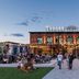 Holiday Inn Salem (I-93 At Exit 2) By IHG in Salem, exterior with lively market patio at dusk