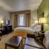 Holiday Inn Express & Suites Montrose - Black Canyon Area By IHG room with two beds, TV, table and chairs