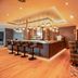 Premier Inn Karlsruhe City Am Wasserturm bar lounge with stools, armchairs and warm ambient lighting