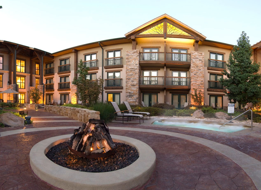 Prairie Band Casino & Resort in Mayetta with outdoor fire pit, lounge chairs, and resort courtyard