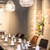 Goldene Traube - by Neugart dining room with long set table and hanging pendant lights in Traben-Trarbach