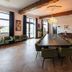Buitenplaats Kasteel Elsloo in Stein, elegant dining room with long table, chandelier and exposed beams