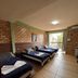 Eco Residencial Dona Francisca room in Florianopolis with three twin beds and balcony view