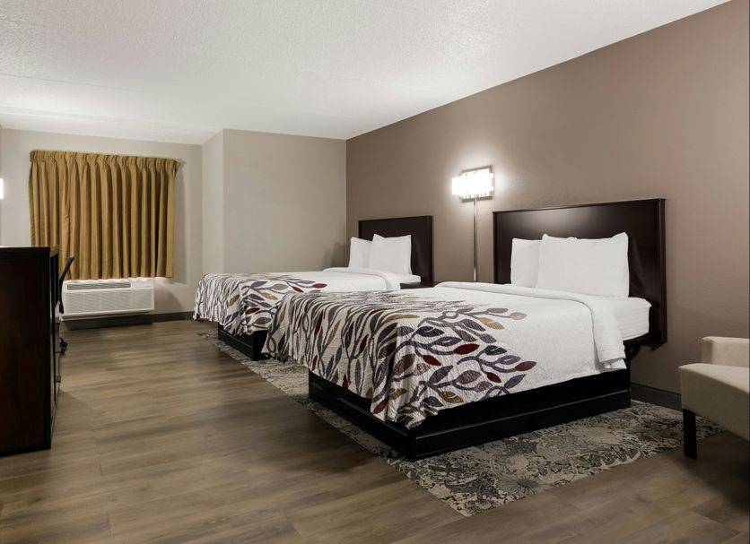 Red Roof Inn Hartford - New Britain room with two beds and window air conditioner