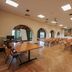 La Certosa di Pontignano in Castelnuovo Berardenga: meeting room with chairs, tables and arched windows