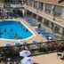 Pyramid Resort Motel in Wildwood Crest with outdoor pool, blue lounge chairs, and sun deck
