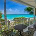 Buoy Haus Beach Resort St. Thomas, Autograph Collection balcony with hanging chair and ocean view