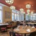Boutique Hotel Waldhaus, Birsfelden dining room with round tables and large windows