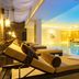 Hilton Kyiv indoor pool with lounge chairs and warm ambient lighting in Kyiv