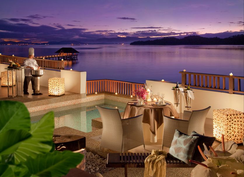 Gaya Island Resort in Kota Kinabalu with rooftop pool, terrace seating and sunset ocean views