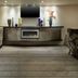 DoubleTree by Hilton Stratford upon Avon lounge with fireplace, armchairs and wall-mounted TV
