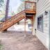 Lower Unit-Yosemite Woods-Inside Yosemite in Yosemite West with exterior staircase and side entry door