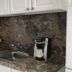 Pyramid Resort Motel in Wildwood Crest kitchenette with sink, coffee maker, and stone-look countertop