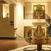 Ananda in the Himalayas in Rishikesh lobby with curved staircase and central round table