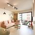 Pavo Art Hotel in Heraklion suite with sofa, coffee table, balcony door and city view