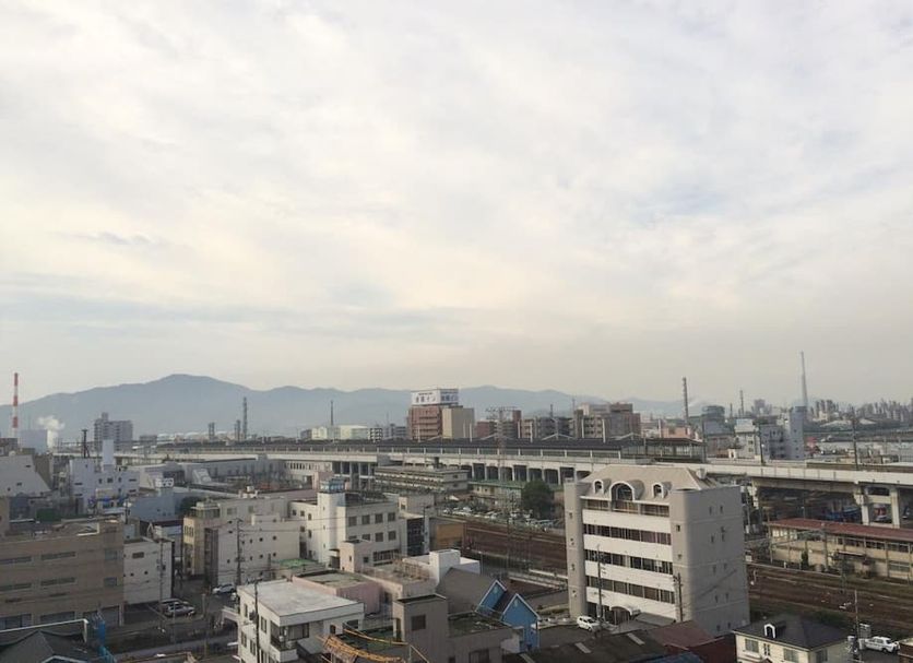 Hotel Crown Hills Tokuyama in Shunan with city and mountain views from an elevated room