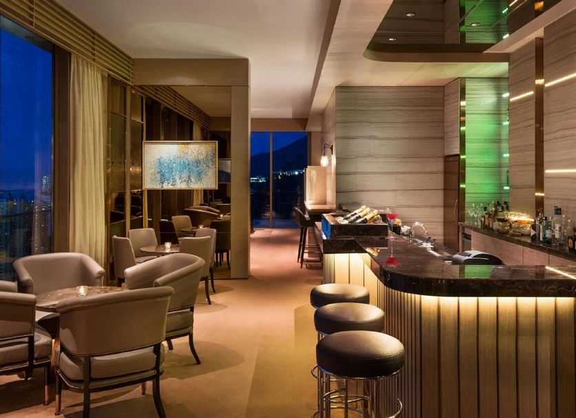 Courtyard by Marriott Hong Kong Sha Tin lobby lounge with bar seating and city views in Hong Kong