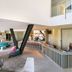 Hampton by Hilton Alcobendas Madrid lobby with reception desk, lounge seating, and bar area in Alcobendas