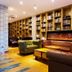 James Joyce Coffetel San Yuan LI Station Guangzhou library lounge with leather sofas and fireplace