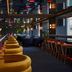 Cardo Brussels, Autograph Collection in Brussels: stylish bar with mustard velvet chairs and mirrored ceiling