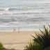 The Pink Lodge on The Beach in Wilderness with a sandy beach and ocean waves
