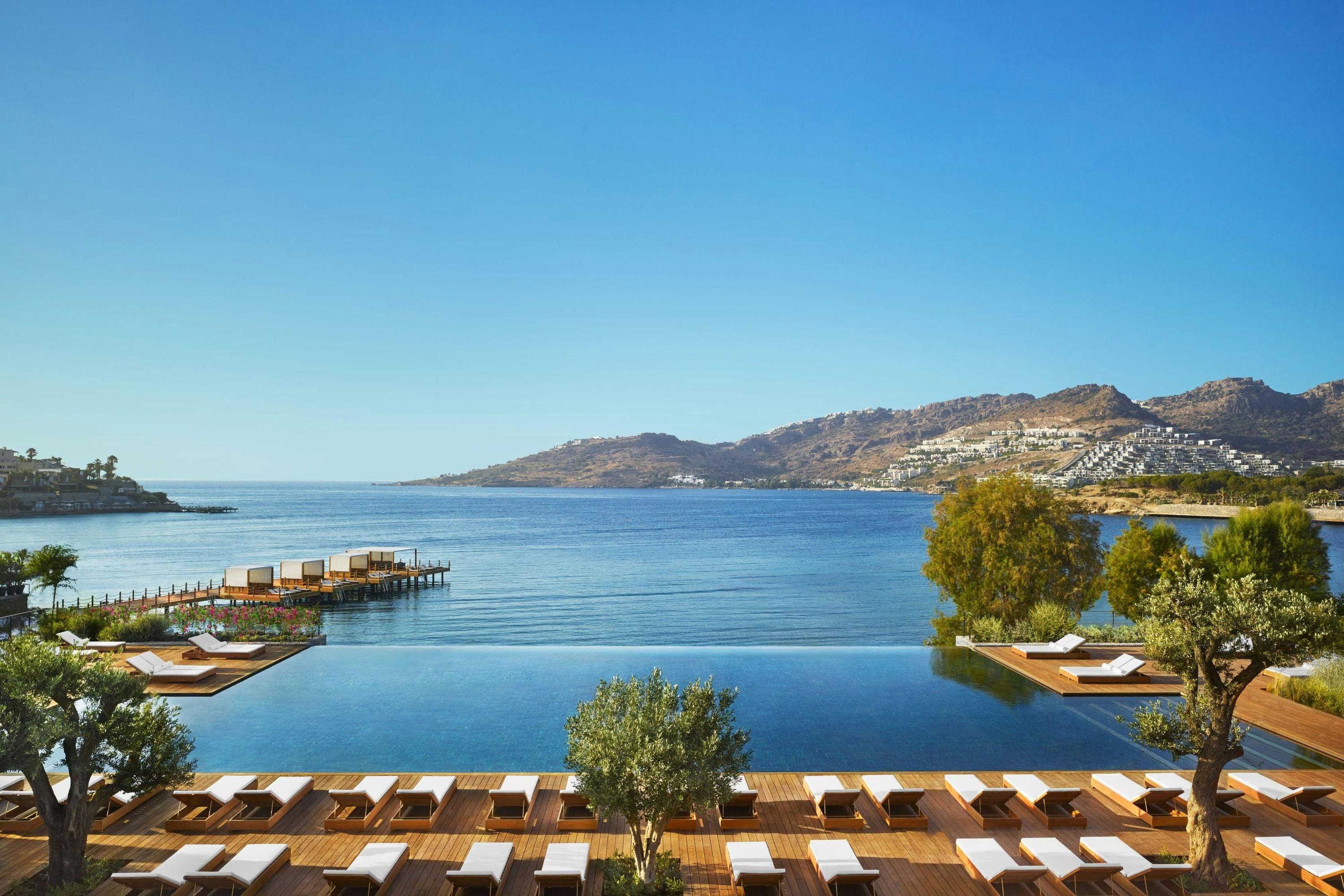 The Bodrum EDITION in Bodrum with an infinity pool overlooking the sea and hills