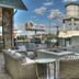 Lodge at Five Oaks Pigeon Forge outdoor patio with wicker seating and water tower views