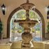 Hotel Tesoro Beach in La Herradura lobby with ornate fountain and arched oceanview doors
