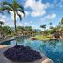 Hanalei Bay Resort in Princeville with tropical lagoon-style pool, palm trees and waterfalls