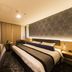 Shin Osaka Esaka Tokyu Rei Hotel guest room in Suita with double bed, TV, and desk