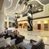 Xiamen Harbor Bay Hotel (Zhongshan Road First Wharf Store) lobby with polished floors, seating, and ornate columns in Xiamen