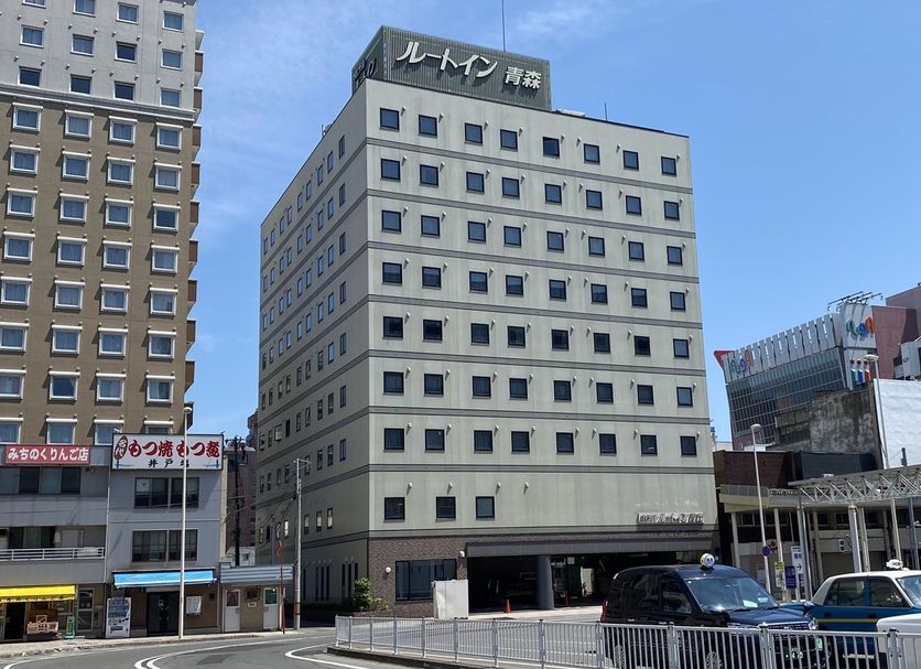 Hotel Route-Inn Aomori Ekimae exterior in Aomori with multi-story facade and city street view