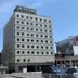 Hotel Route-Inn Aomori Ekimae exterior in Aomori with multi-story facade and city street view