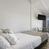 Tasman Holiday Parks - Papamoa Beach room with bed, sofa, balcony and ocean view in Papamoa