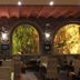 Hotel Spa La Central - Adults Only in Maçanet de Cabrenys, lounge with arched windows and indoor greenery