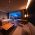 Garden Terrace Nagasaki Hotels & Resorts room with twin beds and balcony view over Nagasaki