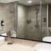 Wyndham Garden Shahzan Fraser's Hill bathroom with vessel sinks and glass-enclosed shower in Frasers Hill
