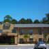 Western Motel Inn and Suites Hazlehurst exterior with front entrance and parking lot
