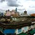 Urban Hostel Bangkok rooftop city view over Bangkok skyline and low-rise buildings