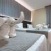 Pietro Angelo Hotel in Foz do Iguaçu room with elephant towel sculptures on the beds