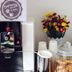 Vanilla Residence Chiangmai complimentary coffee station with machine, cups, and flower arrangement in Chiang Mai