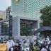 Hi Inn (Xuzhou Yunlong Wanda Plaza) in Xuzhou, exterior with geometric facade and parked scooters