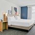 Spark by Hilton Mechanicsburg Harrisburg West guest room with king bed, desk, and window seating
